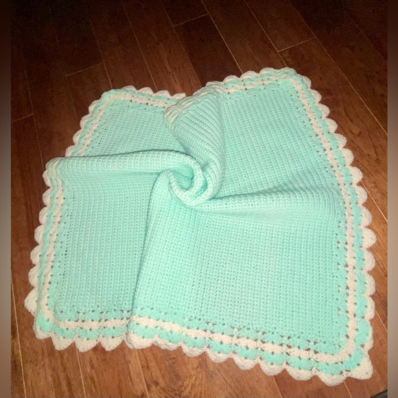 Vintage large baby blacker that was crocheted w 2 colors white and teal heavier